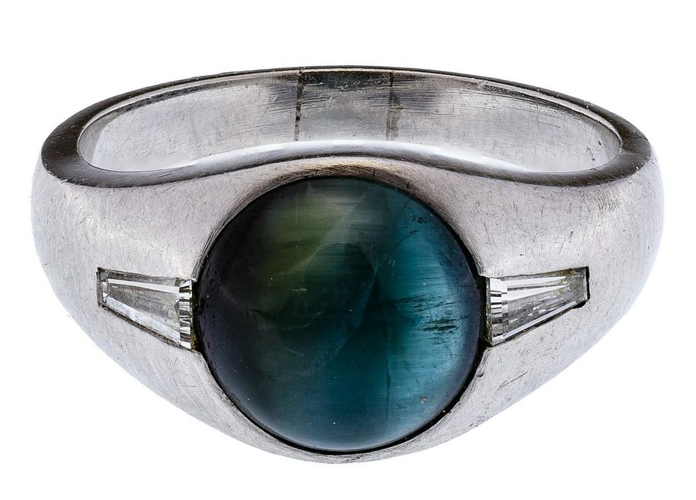 Lot 297: Platinum, Cat Eye Tourmaline and Diamond Ring