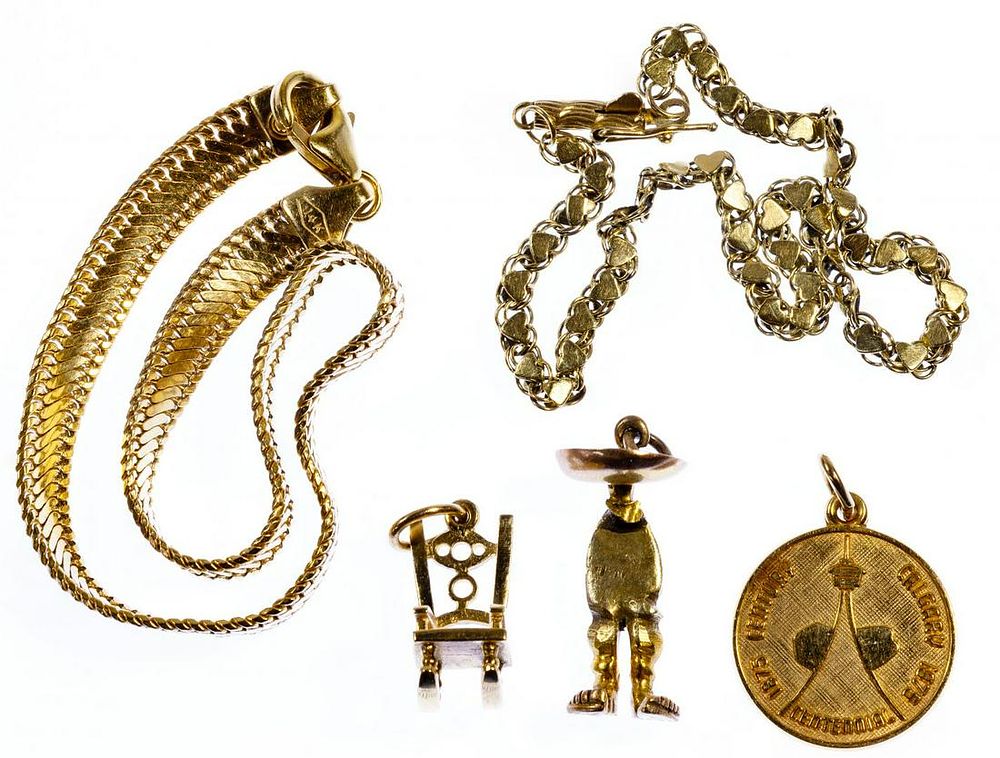 Lot 317: 14k Gold Bracelet and Charm Assortment