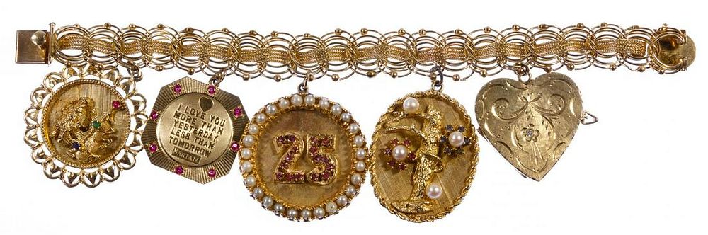 Lot 308: 14k Gold Charm Bracelet