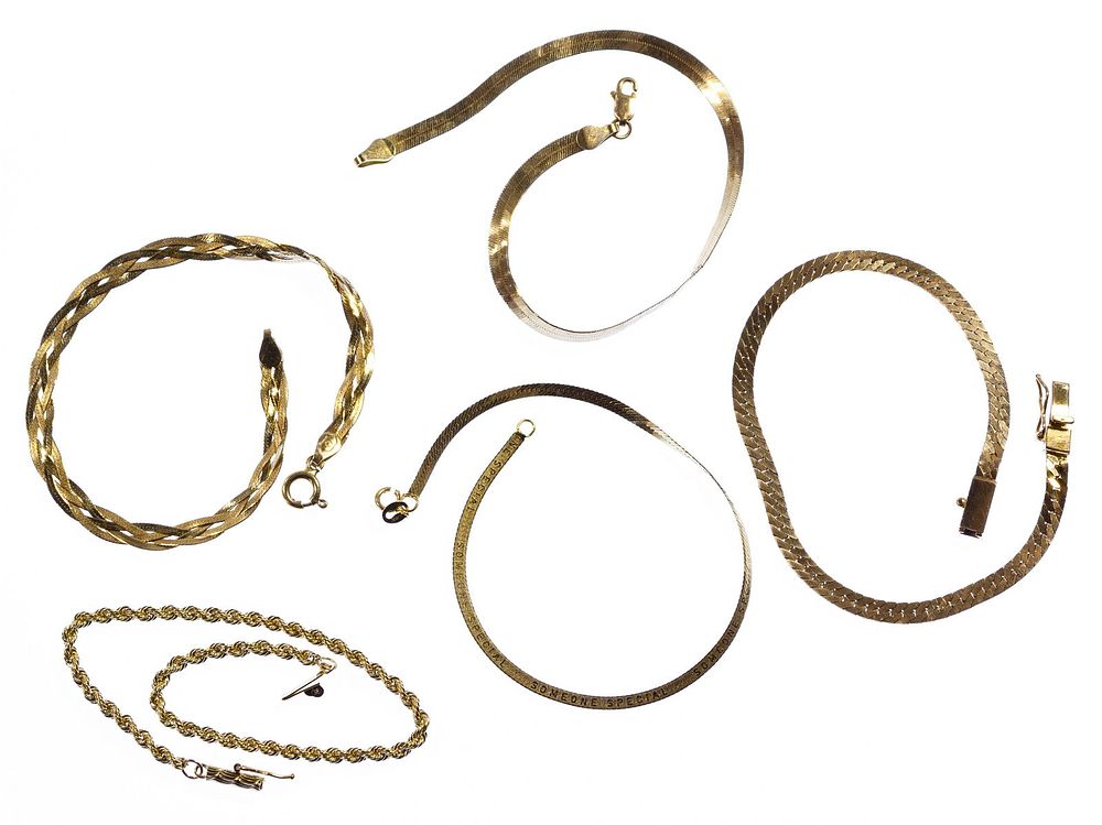 Lot 313: 14k Gold Bracelet Assortment