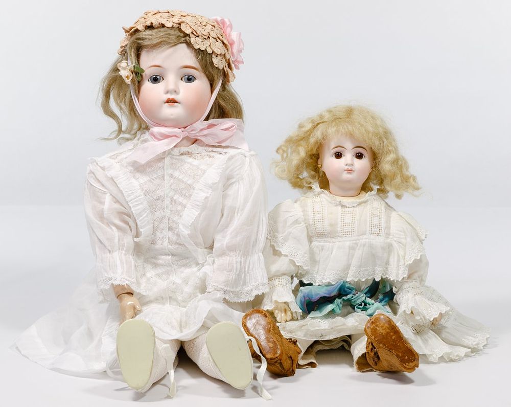 Lot 503: German Bisque Swivel Head Dolls