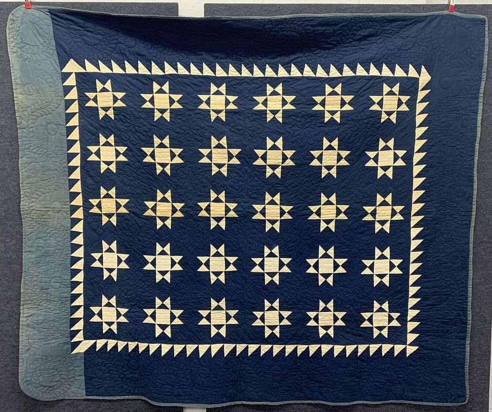 Lot 175: Hand-Stitched Ohio Eight Point Star Quilt