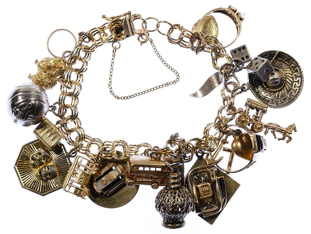 Lot 305: Mixed Gold and Silver Charm Bracelet