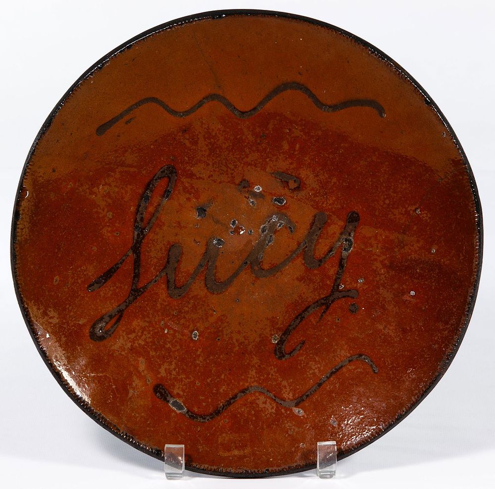 Lot 701: Pennsylvania Redware Slip Charger
