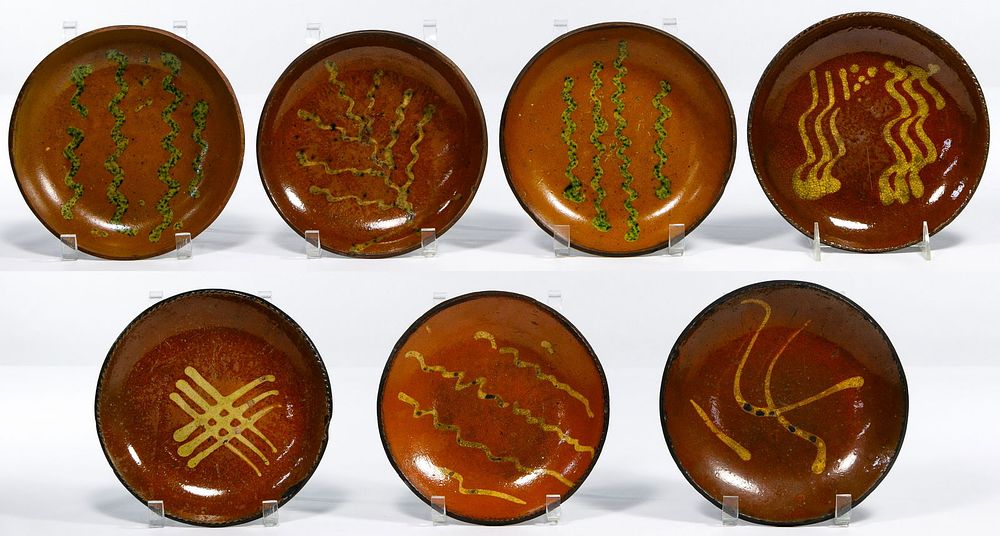 Lot 710: Redware Slip Decorated Plate and Bowl Assortment