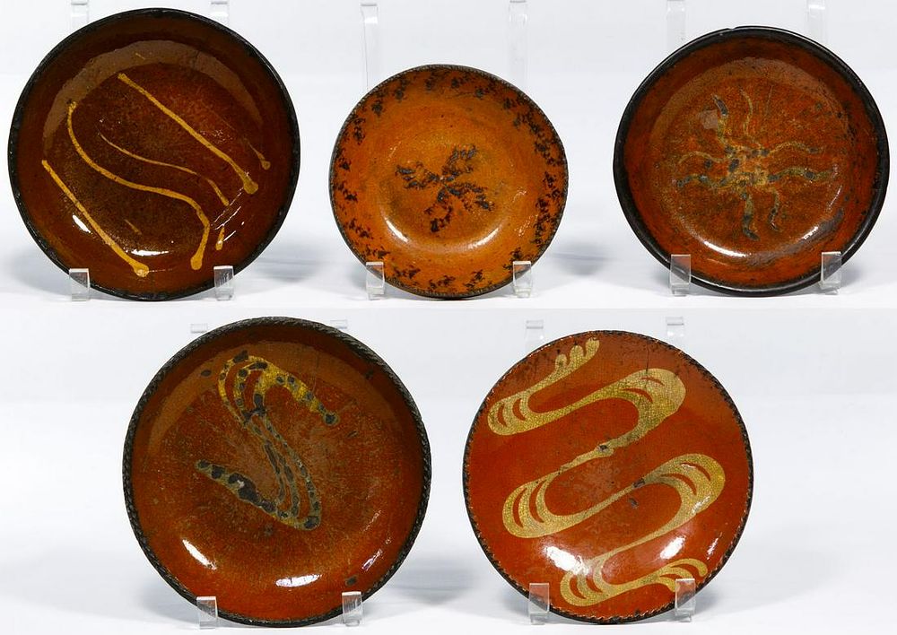 Lot 711: Redware Slip Decorated Plate and Bowl Assortment