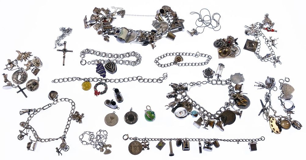 Lot 342: Sterling Silver Charm Bracelet and Charm Assortment