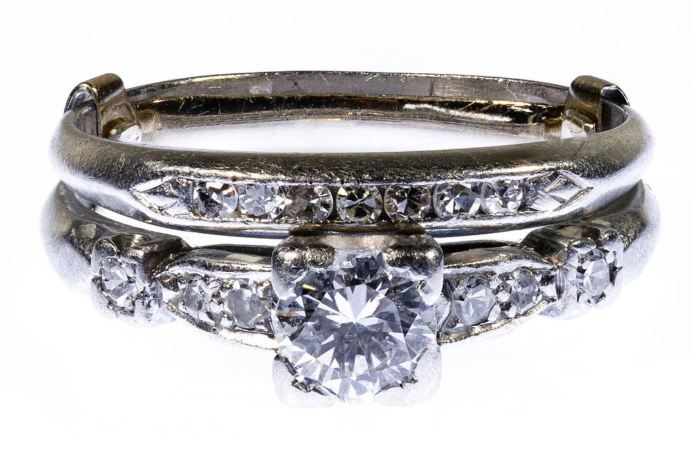 Lot 198: Platinum and Diamond Wedding Ring Set