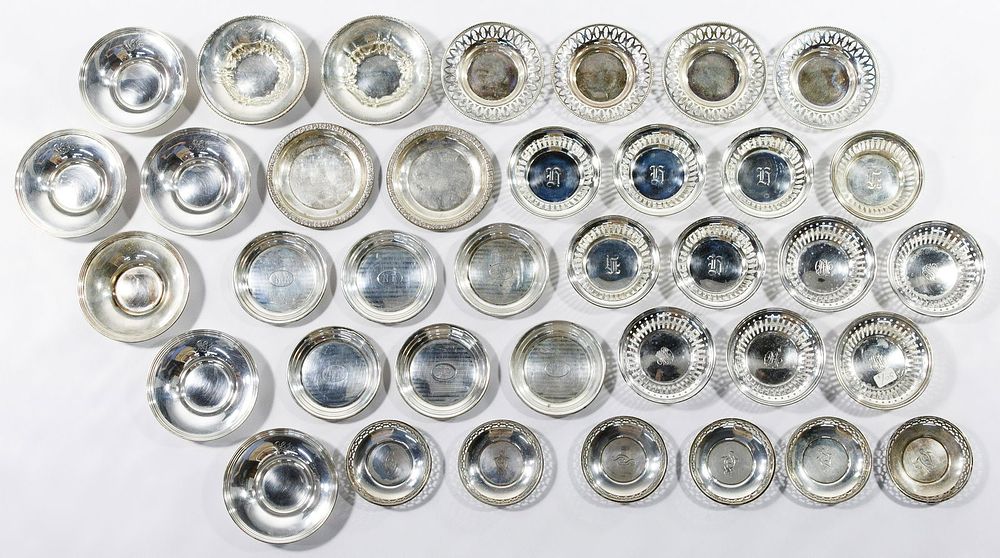 Lot 151: Sterling Silver Round Nut Dish and Coaster Assortment