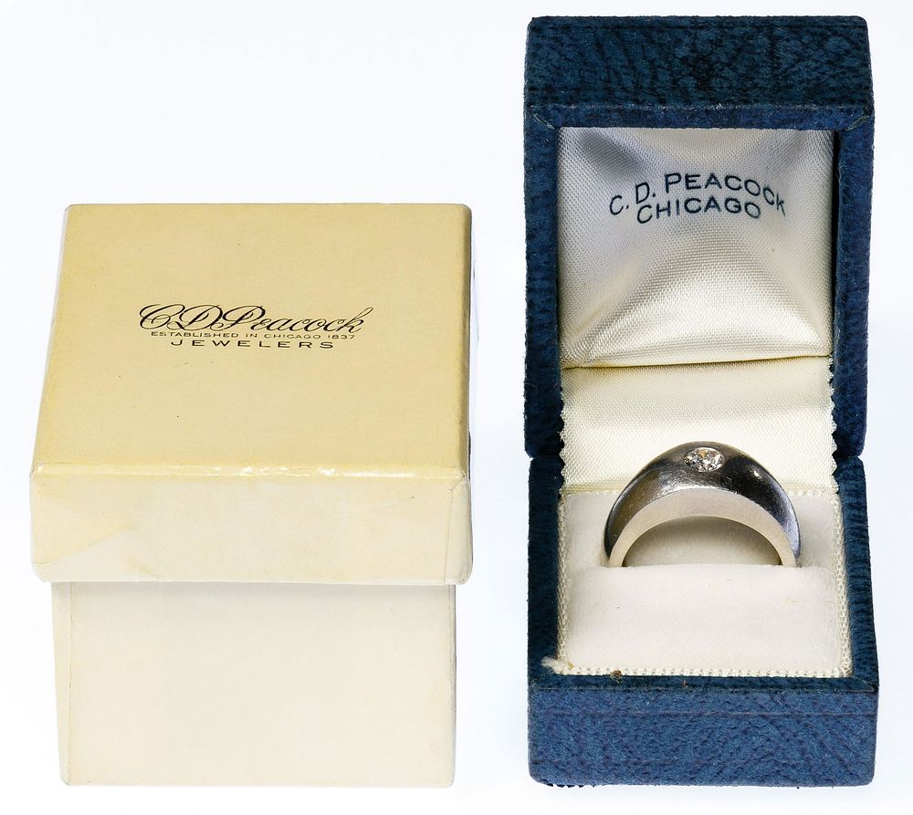 Lot 197: C. D. Peacock Platinum and Diamond Ring