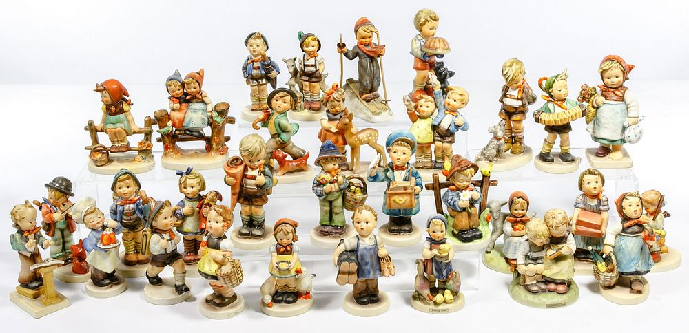Lot 374: Hummel / Goebel Figurine and Plate Assortment