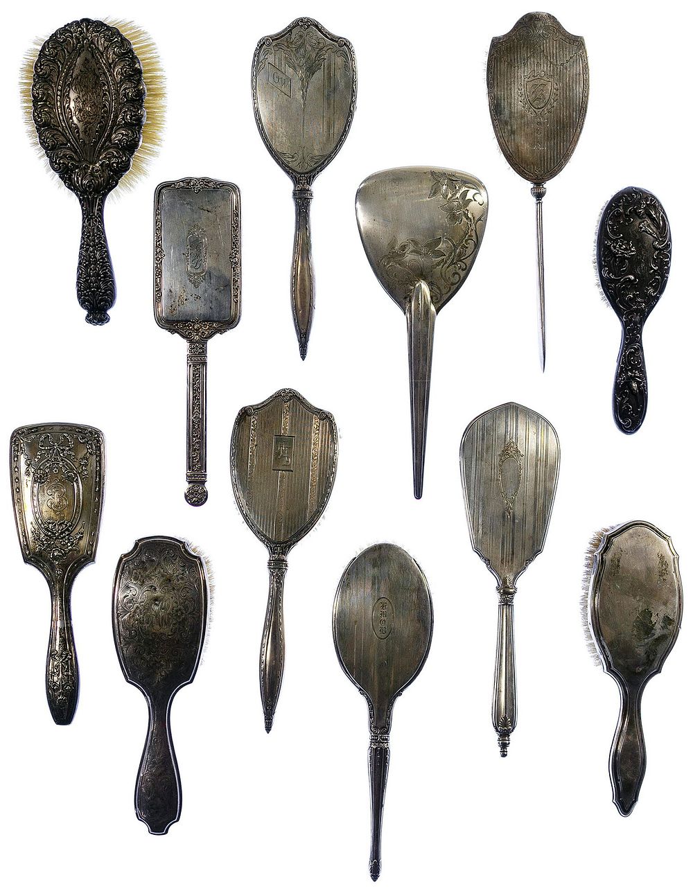 Lot 407: Sterling Silver and European Silver Vanity Handled