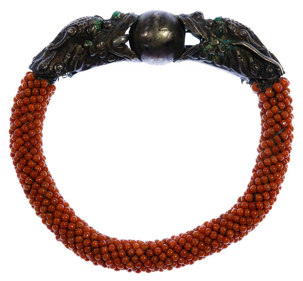 Lot 457: Sterling Silver and Coral Bangle Bracelet