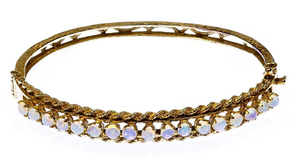 Lot 165: 14k Gold and Opal Bracelet