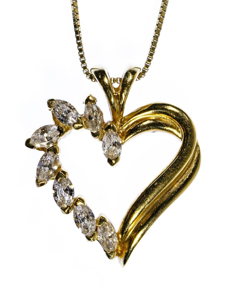 Lot 178: 14k Gold and Diamond Heart Shaped Pendant Necklace