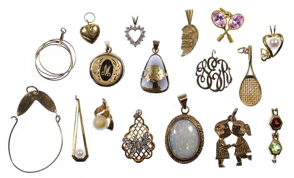 Lot 180: 14k Gold Pendant and Charm Assortment