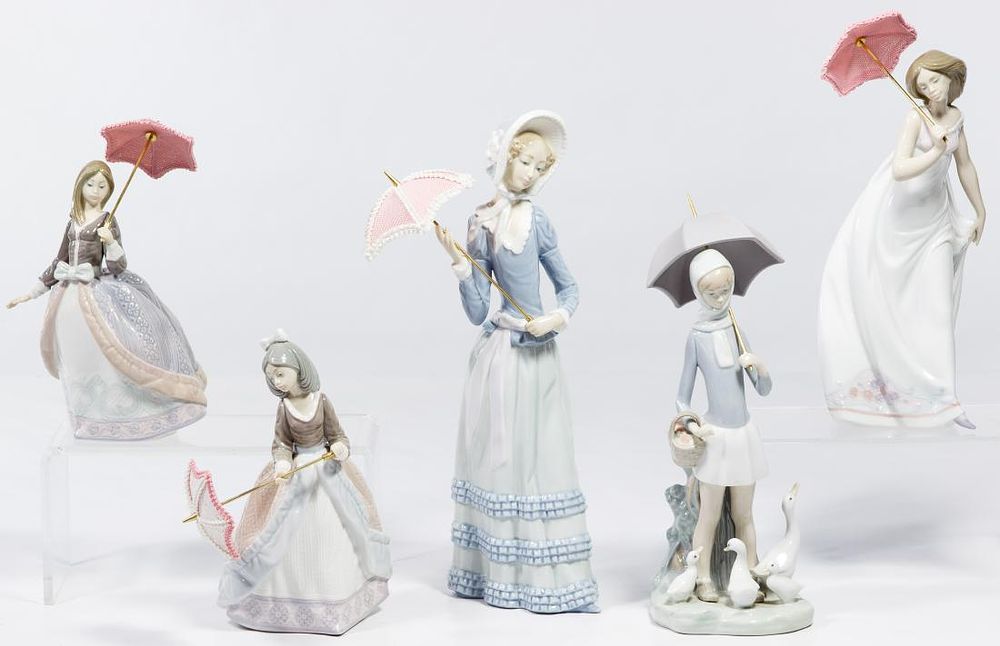 Lot 320: Lladro Umbrella Lady Figurine Assortment