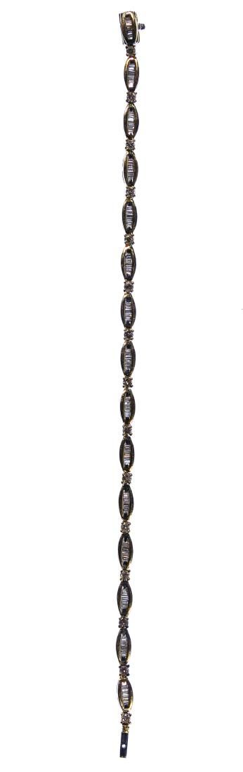 Lot 154: 14k Gold and Diamond Tennis Bracelet
