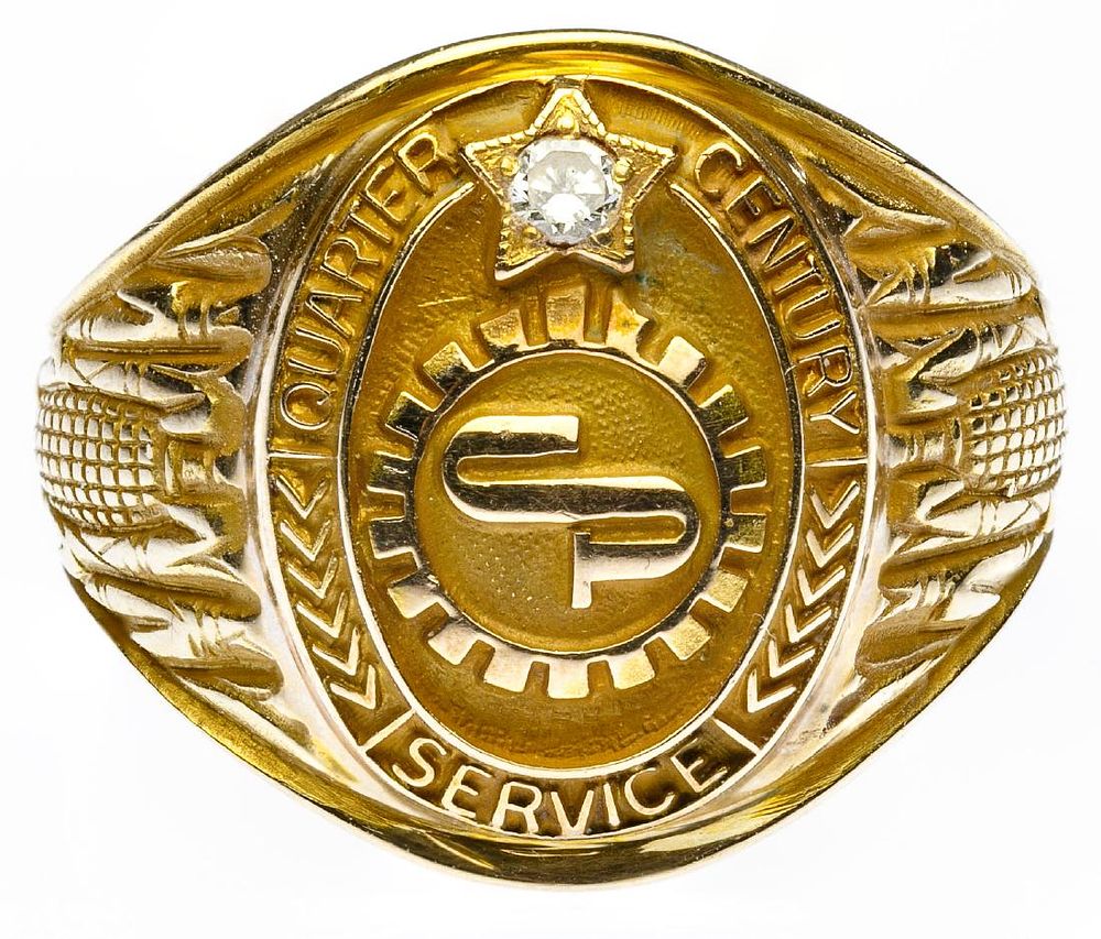 Lot 207: 10k Gold and Diamond Service Ring