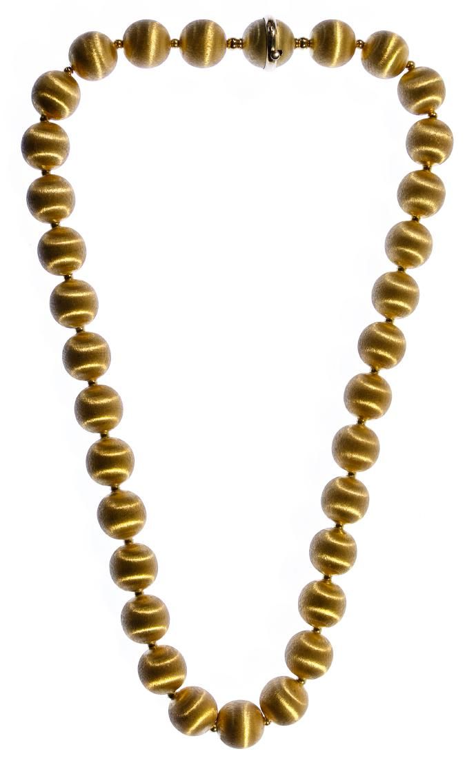 Lot 454: 18k Gold Bead Necklace