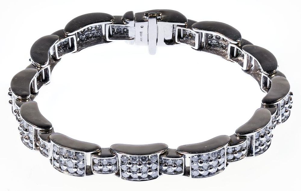 Lot 472: 14k White Gold and Diamond Bracelet