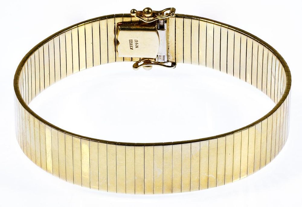 Lot 481: 14k Gold Omega Bracelet