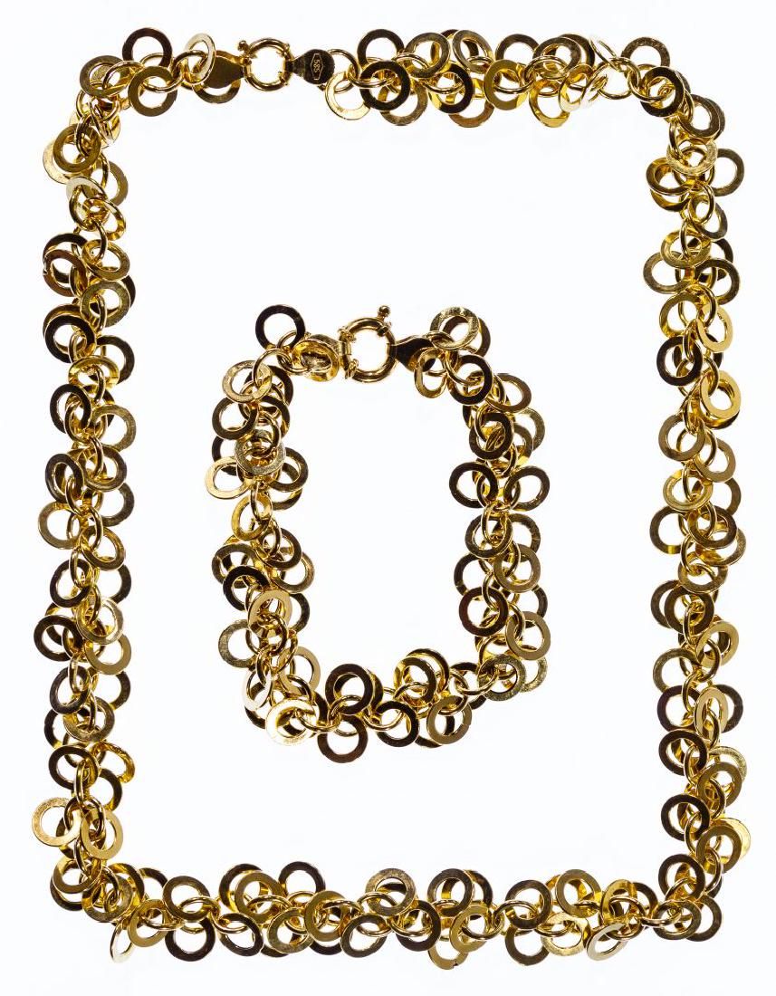 Lot 497: 14k Gold Circle Link Necklace and Bracelet