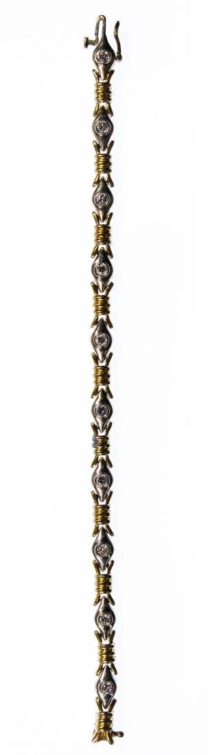 Lot 498: 14k White and Yellow Gold and Diamond Bracelet