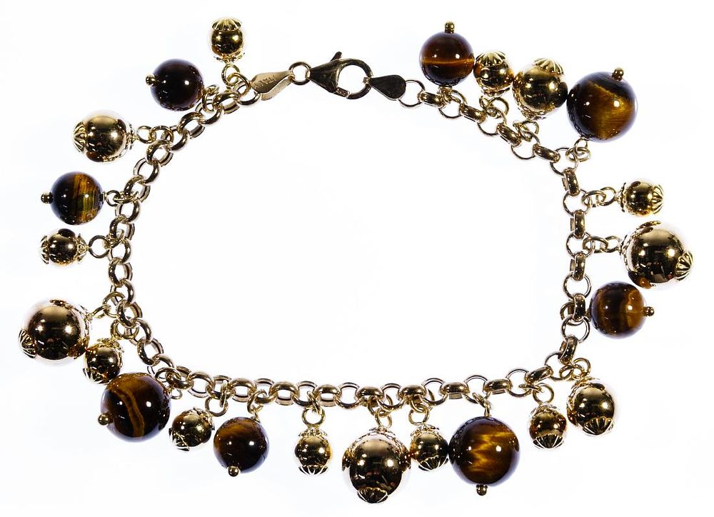 Lot 504: 14k Gold and Tiger Eye Bracelet