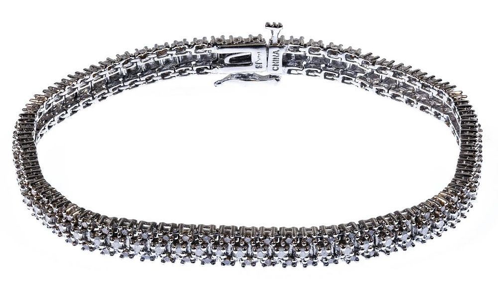 Lot 519: 14k White Gold and Diamond Bracelet