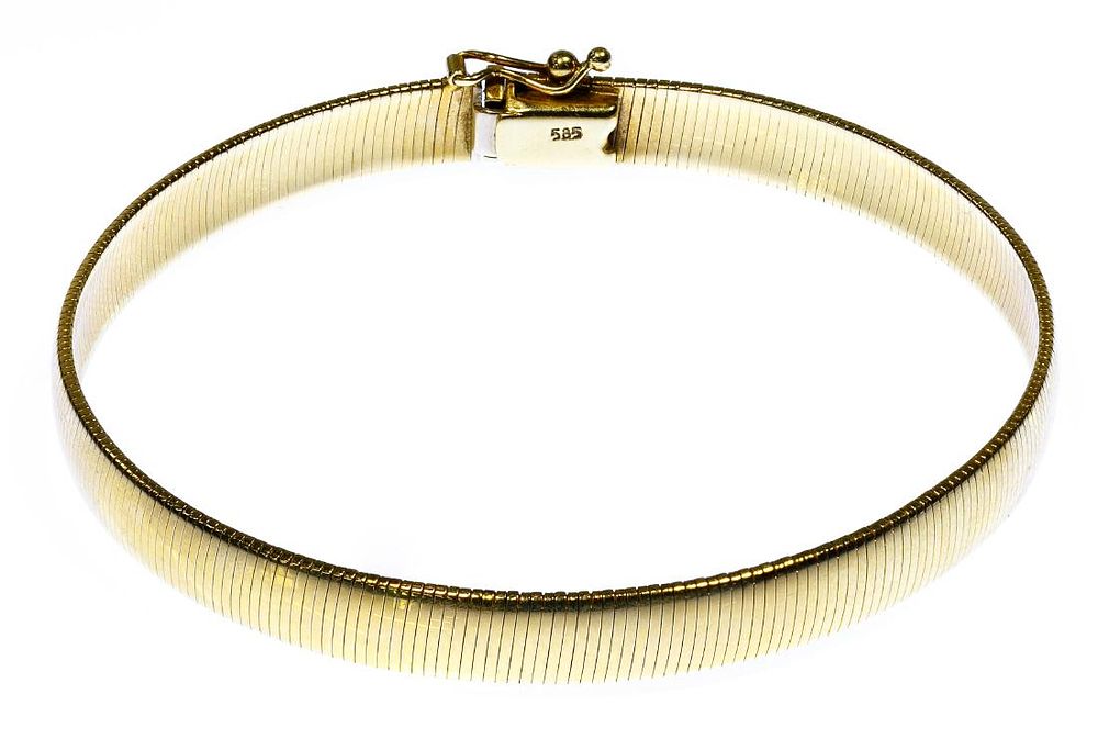Lot 525: 14k Gold Omega Bracelet