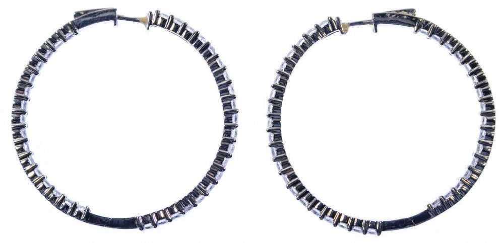 Lot 553: 14k White Gold and Diamond Earrings