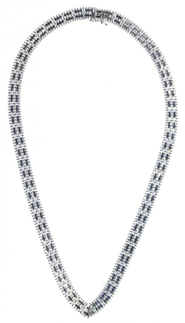 Lot 599: 14k White Gold Woven Necklace