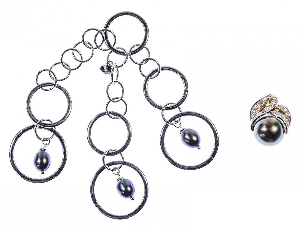Lot 675: Platinum, 18k White Gold and Pearl Pendant Assortment