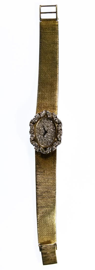 Lot 690: Movado 14k Gold Case and Band Wrist Watch
