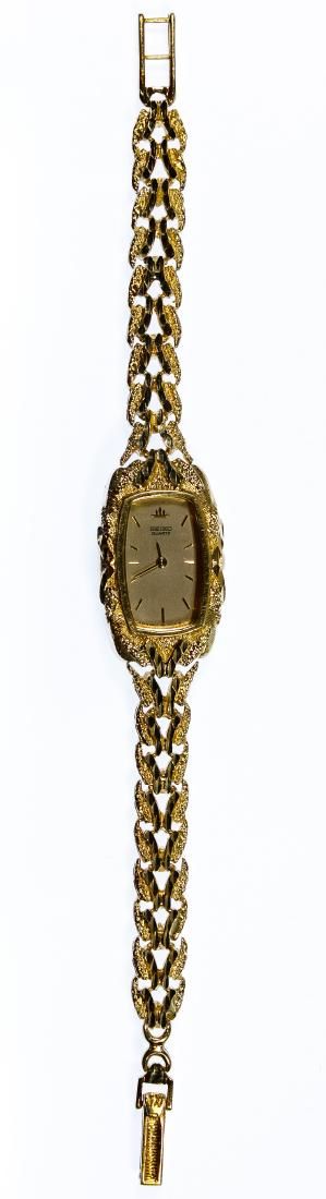 Lot 255: Seiko 14k Gold Surround and Band Wrist Watch