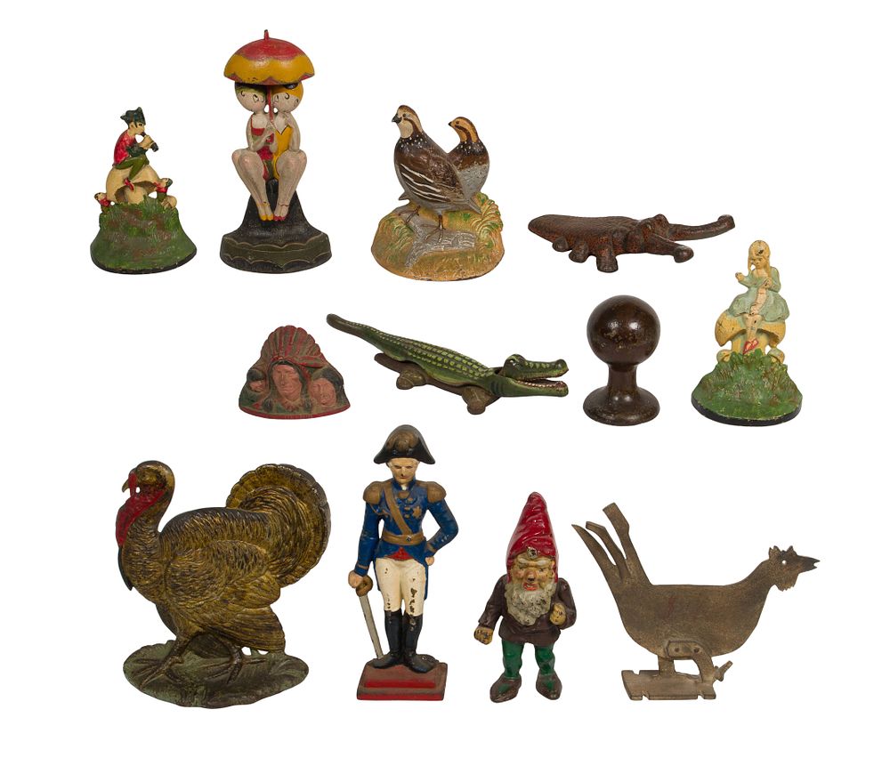 Lot 334: Cast Iron Figural and Animal Doorstop Assortment