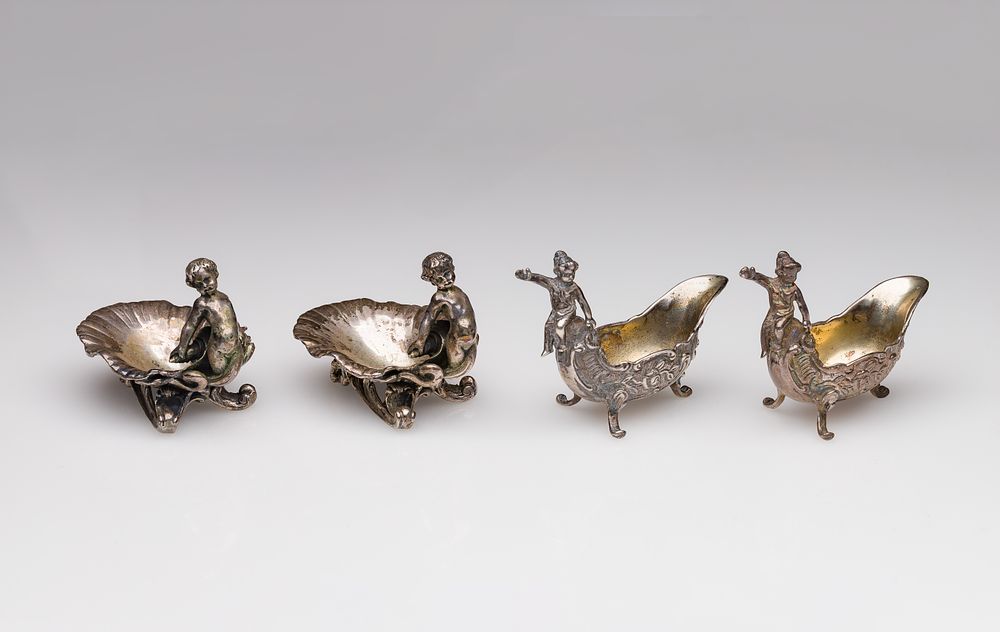 Lot 285: Sterling Silver Putti Salt Cellar Assortment