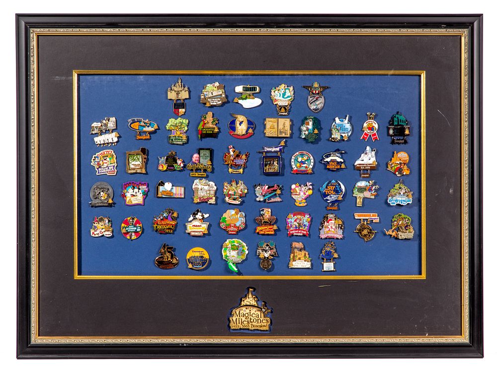 Lot 252: Disney 'Magical Milestones Pin Celebration' Framed Pin Set