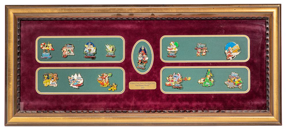 Lot 254: Disney 'Mickey's Very Merry Christmas Party' Framed Pin Set
