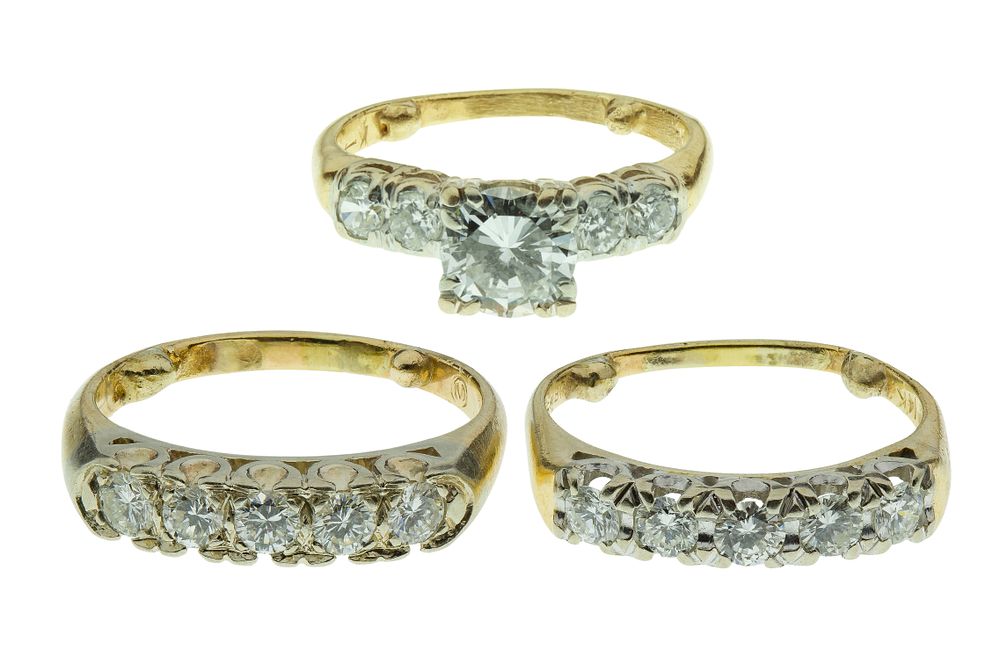 Lot 483: 14k Yellow Gold and Diamond Wedding Ring Set