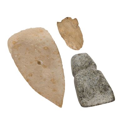 Axe Head and Spearhead Assortment (3) items including a green stone axe head and (2) brown 