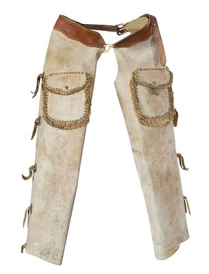 Batwing Leather Studded Chaps Having a tooled leather belt and studded Texas stars and pockets 
