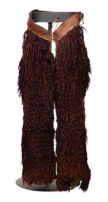 Brown Leather Woolie Chaps A pair having light brown leather with dark brown woolie chaps 