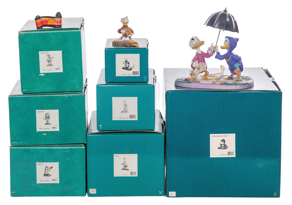 Lot 413: Walt Disney Classics Porcelain and Resin Figurines