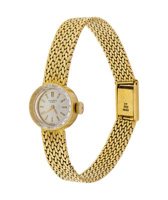 Universal Geneve 18k Yellow Gold Case and Band Wristwatch Round face having a 17-jewel movement 