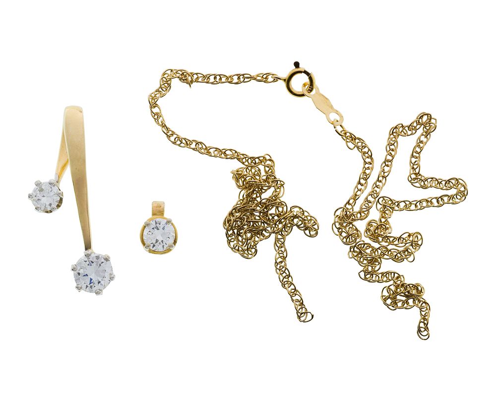 Lot 264: 14k Gold and Diamond Pendant on Necklace
