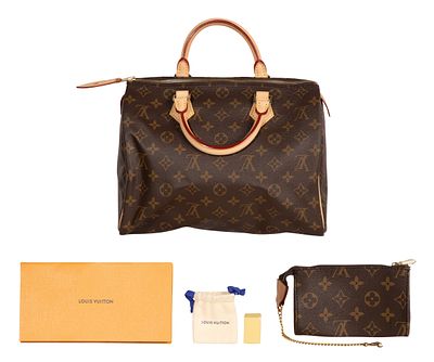 Louis Vuitton - Louis Vuitton Speedy 30 Handbag Having coated exterior monogram canvas, interior 