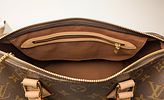 Louis Vuitton - Louis Vuitton Speedy 30 Handbag 
Having coated exterior monogram canvas, interior Image - 4