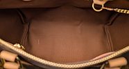 Louis Vuitton - Louis Vuitton Speedy 30 Handbag 
Having coated exterior monogram canvas, interior Image - 6